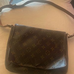 Authentic or money back!!! Used Louis Vuitton Musette Tango bag